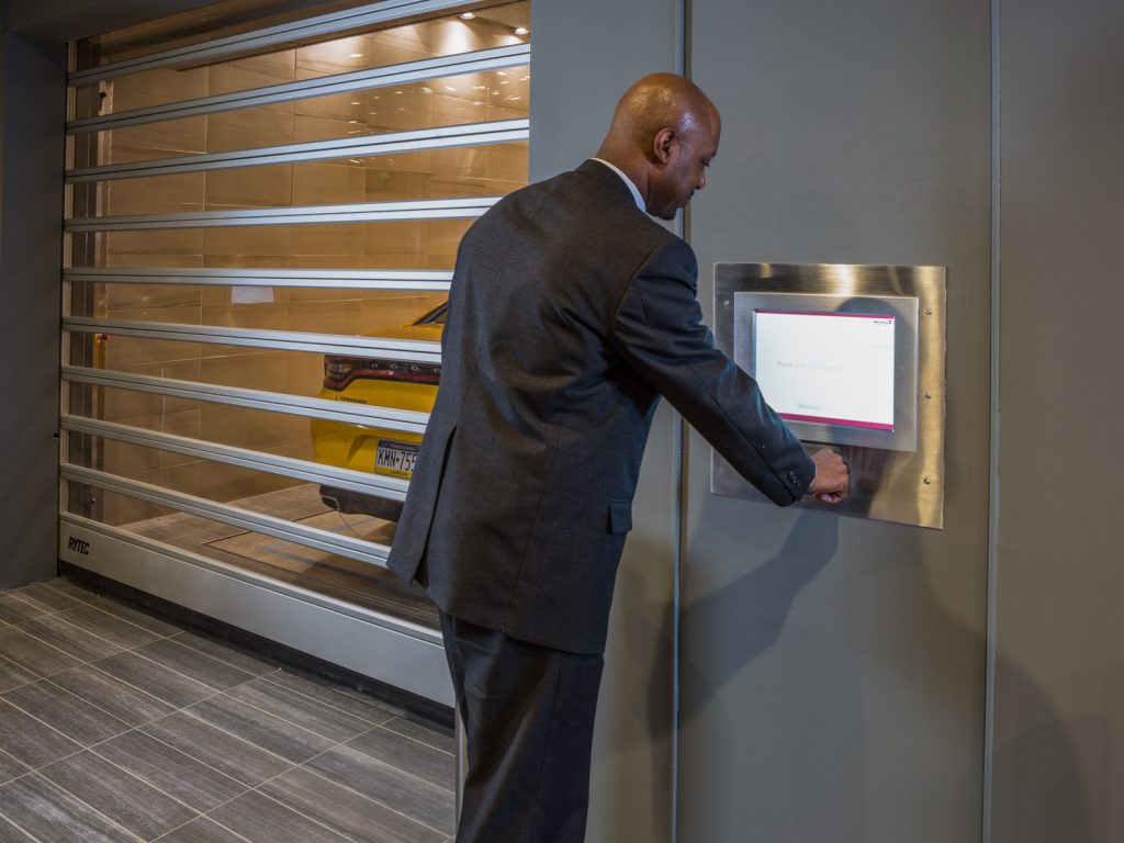 Transfer vehicle area, showing the Siemens HMI that walks the user through the automated parking process.